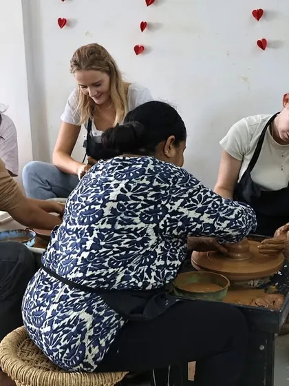 Clay, laughs, and good company. Our studio is always filled with smiles and creativity.
