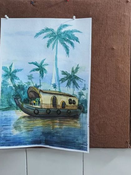 A beautiful watercolor painting of a houseboat in Kerala, created by one of our talented adult students.