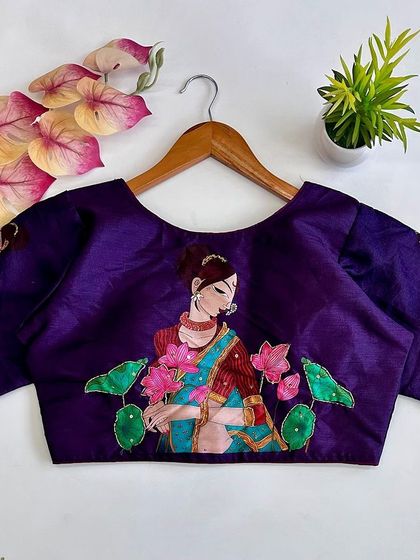 The printed pure silk blouse in a rich purple shade.
