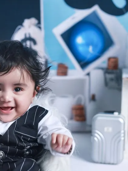 This little one is ready to join the heist, dressed in a pinstripe suit. Our themed shoots often have multiple costume options to create a full story.