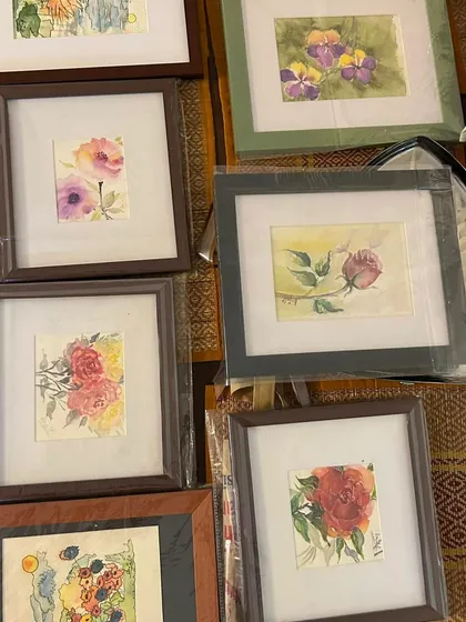 A collection of my small, framed watercolor paintings ready to be gifted. These little pieces of art make for unique and personal presents.