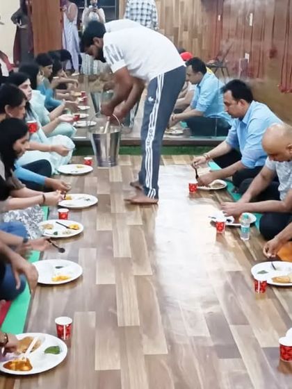 Students enjoying a well-deserved meal together during our bhandara celebration.