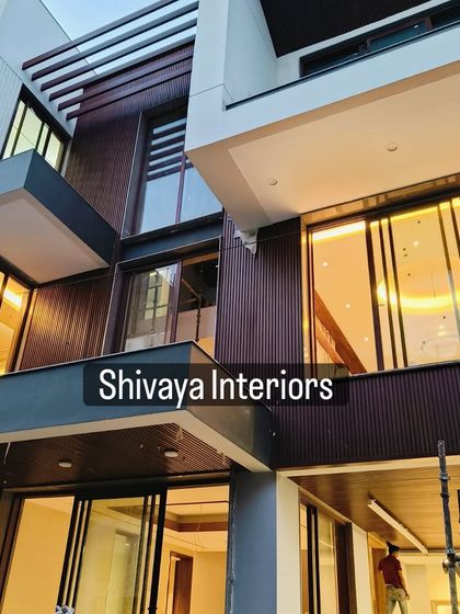 The right facade design comes alive at night with strategic lighting. For this project, I installed vertically grooved, deep-toned cladding that interacts beautifully with both natural and artificial light, highlighting the building's modern architectural lines.