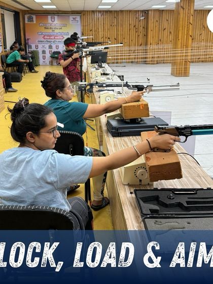 Shooters lock, load, and aim during a pistol training session. This image captures the moment of intense concentration just before the shot is fired.
