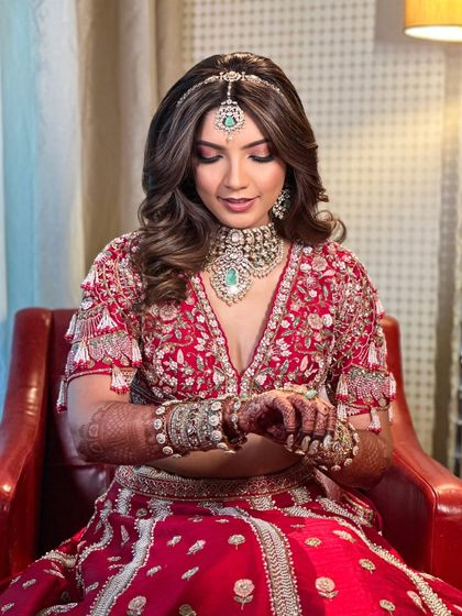 A closer look at Priyanka's soft bridal makeup. The eyes are subtly defined, and the skin has a luminous finish, creating a look that is both modern and timeless.
