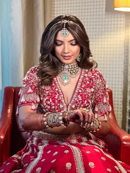 A closer look at Priyanka's soft bridal makeup. The eyes are subtly defined, and the skin has a luminous finish, creating a look that is both modern and timeless.