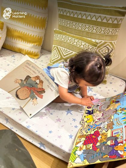Lost in a world of pictures and words. In our comfortable reading nooks, children are free to explore books at their own pace, developing a personal and positive relationship with reading.