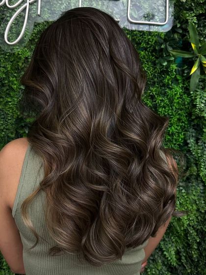 The back view of another one of my signature balayage looks. The placement is strategic to create depth and the illusion of fuller, thicker hair.