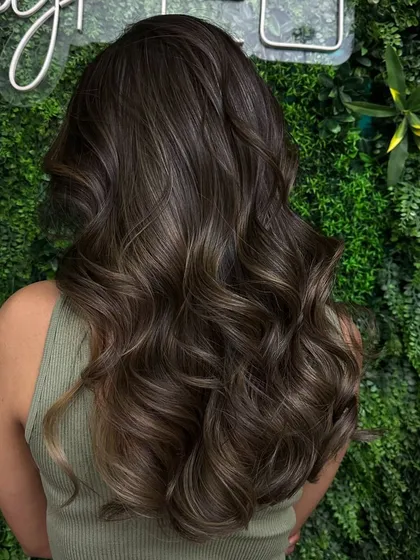 The back view of another one of my signature balayage looks. The placement is strategic to create depth and the illusion of fuller, thicker hair.