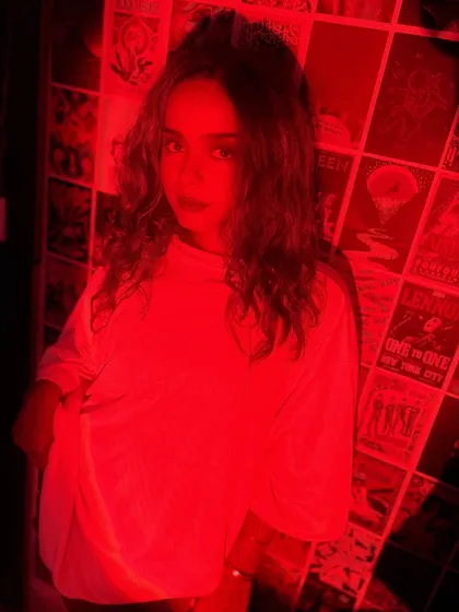 A moody shot under a red light. This photo captures the vibe of my club nights: intense, atmospheric, and a little bit mysterious.