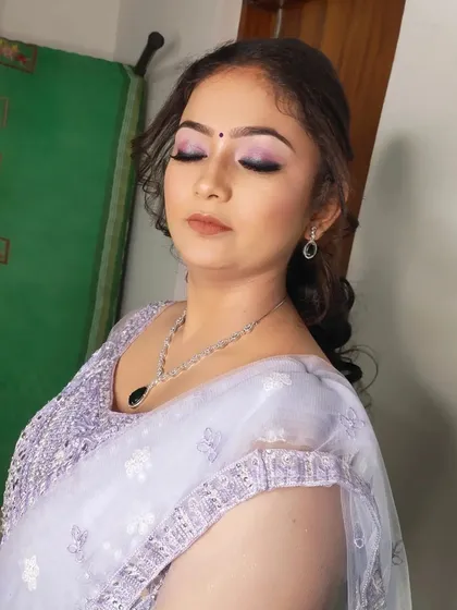 Another angle showing the beautiful shimmer on the eyelids and the overall soft glam effect.