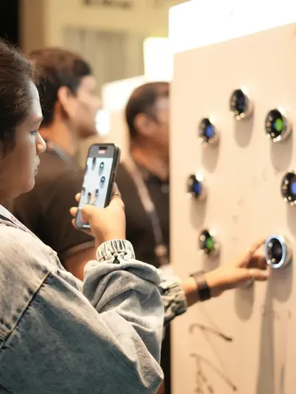 A visitor captures a photo of an innovative smart switch display. The visually engaging booths we help create ensure that your products get noticed and remembered.