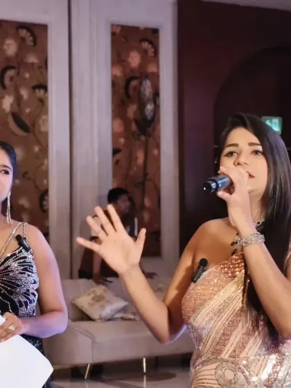 In action with my co-host, engaging the audience and guiding the flow of the anniversary Sangeet. Two hosts can bring double the energy to a large-scale event.