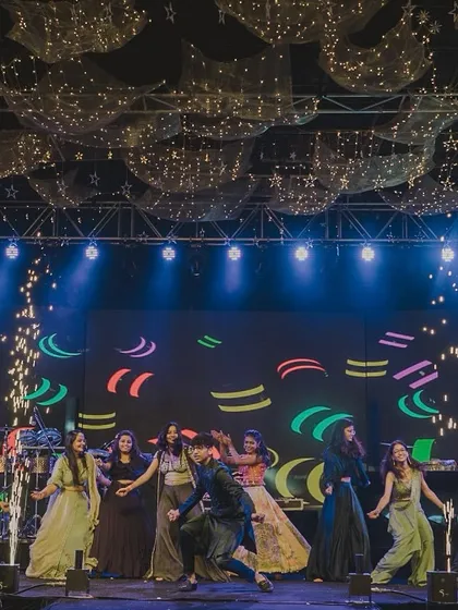 The Sangeet stage in full swing. The professional lighting and large LED backdrop I installed provided a dynamic and exciting setting for all the family dance performances.