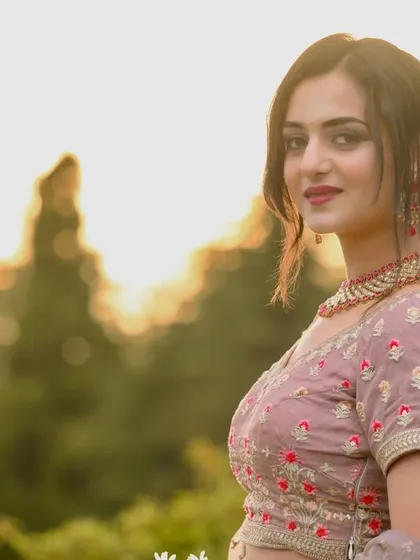 A portrait of a model in a bridal lehenga, shot at sunset for a music video. This shows my ability to create a soft, romantic look.
