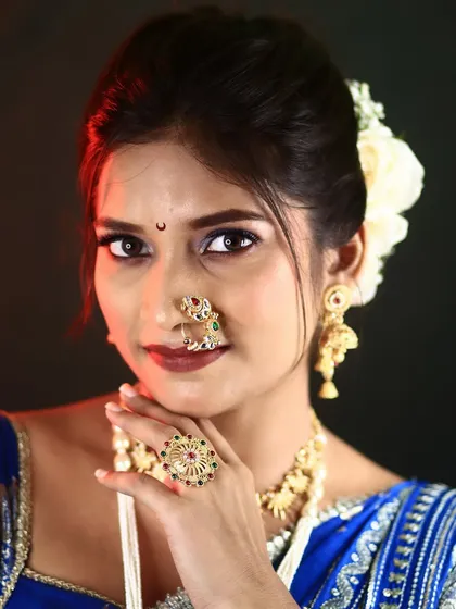 A close-up portrait inviting you to see the flawless base and detailed eye work. This is the quality of makeup you can learn in my classes.