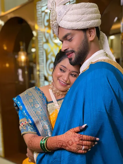 A sweet moment of the bride and groom. The makeup is designed to look great from all angles and in all lighting.