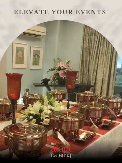 Our commitment to elegance is visible in every detail. This buffet setup features our premium copper chafing dishes and tasteful floral arrangements, showcasing how we elevate the dining experience beyond just the food.