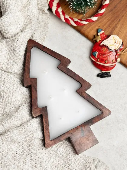 Another view of the wooden Christmas tree candle. It's a substantial piece that makes a wonderful, fragrant centerpiece for your holiday table.