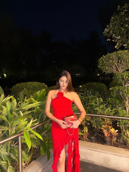 A romantic look for a night out with Oros. I'm wearing a stunning red halter dress with a floral detail and ruffled hem.