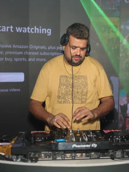 A shot of me mixing with the club visuals in the background at Bangtan Lounge. The right lighting and visuals complete the musical experience.