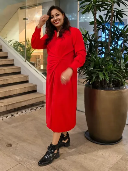 A candid, happy moment. A smile is the most important accessory for any host, and I am never without one.