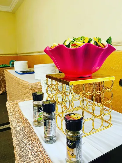 A healthy and refreshing salad bar is a great addition to any buffet. I provide a mix of fresh greens, vegetables, and a selection of dressings and seasonings for guests to create their own salads.