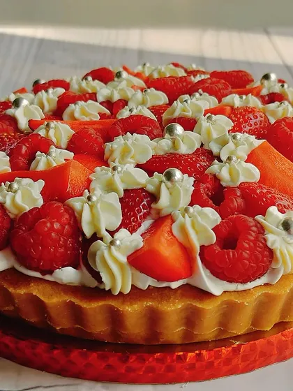 My Strawberry and Raspberry Cheesecake Tart is a fruity dream come true, with a creamy filling and a burst of fresh berries.