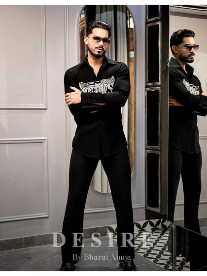 Another view of the 'BAD BOYS' gun shirt, showcasing its sharp fit and the bold statement it makes.