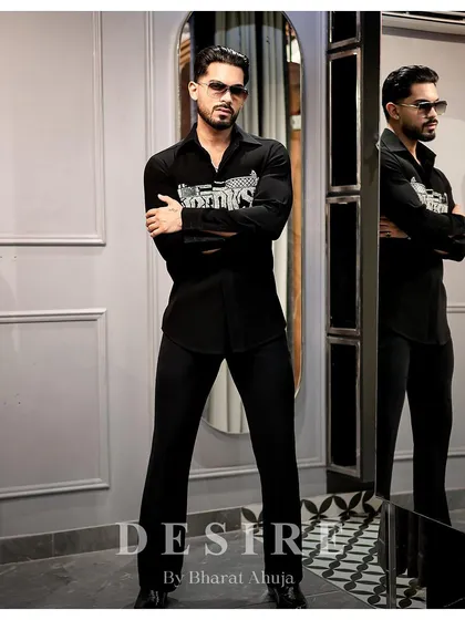 Another view of the 'BAD BOYS' gun shirt, showcasing its sharp fit and the bold statement it makes.
