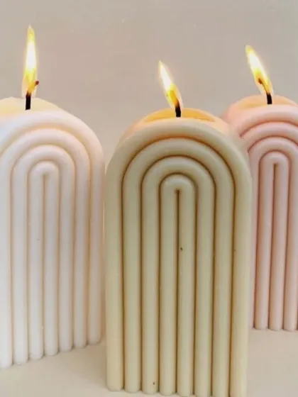 Our arch candles look beautiful when lit, creating a warm and modern ambiance.