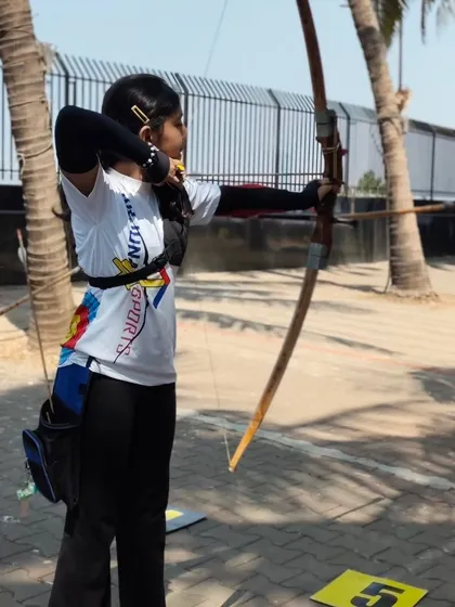 A girl takes her shot at the selection trials. We provide a supportive environment for female athletes to excel.