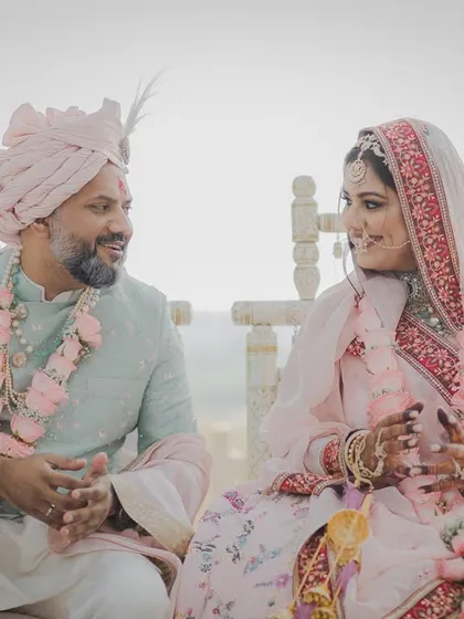 A quiet conversation between the bride and groom during their outdoor ceremony. We capture these small interactions that tell the bigger story of their relationship.