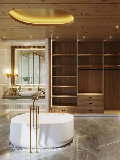 A view focusing on the elegant freestanding tub and its minimalist gold-finish faucet, set against a backdrop of grey marble and rich wood.