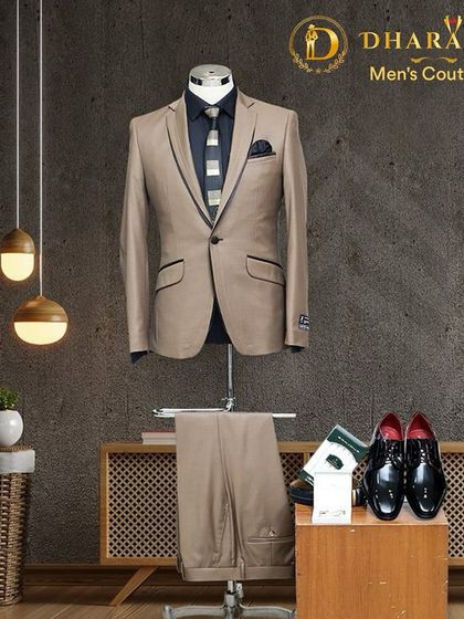 A complete formal look on display. This beige suit with black piping is paired with a dark shirt, striped tie, and formal shoes, showing how I can style a full ensemble.