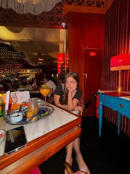 A candid, pensive moment during dinner.