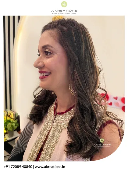 A soft and romantic look with a braided detail and gentle waves. This hairstyle is perfect for a daytime event or a sophisticated evening out.