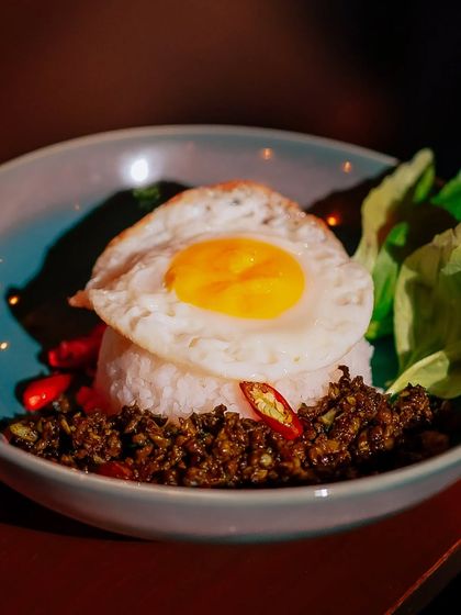 A closer look at our Krapow, a dish that brings joy in the most unexpected and delicious ways.