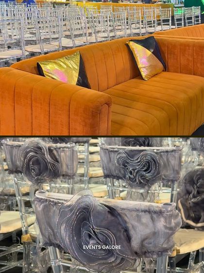 Seating that matches the theme. For the Sangeet night, I used vibrant orange velvet sofas for VIP areas and adorned the guest chairs with custom-designed sashes to elevate the overall decor.