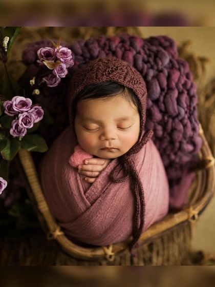 This little lady has stolen everyone's heart. A similar setup with rich purple and mauve tones, showing the variety of props and colors I offer.