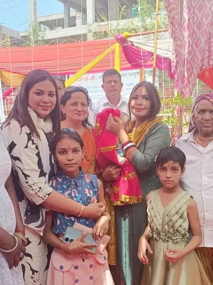 With women and children from the community at the DLSA camp. Ensuring that even the youngest members of society are aware of their rights is a vital part of our work.