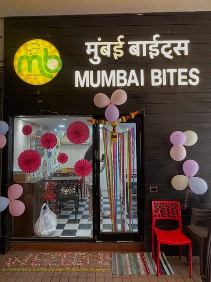 The storefront of our Thane outlet, showcasing our bright and inviting brand identity. People recognize the Mumbai Bites logo, giving your franchise an immediate advantage and attracting customers from the moment you open.