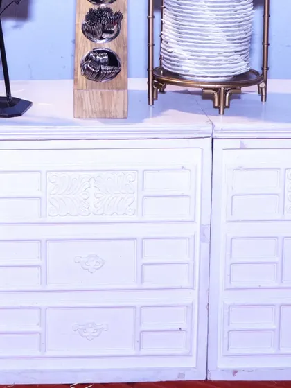 A well-organized cutlery and plate station. The elegant plate stand and wooden cutlery holder are part of the complete, professional setup I provide.