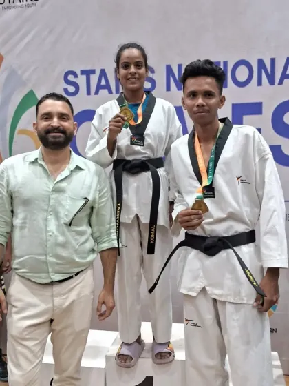 Celebrating our senior athletes' success on the national stage. Here are two of our black belt students on the podium at the Stairs National Games, a testament to their dedication and our elite training program.