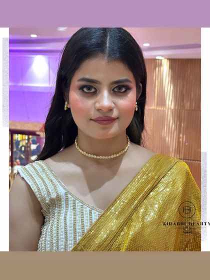 A simple yet stunning look for an evening out. The focus is on flawless skin and shimmery gold eyes, paired with a simple pearl choker.