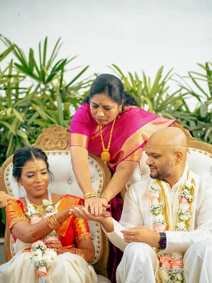 I have had the honor of hosting many beautiful South Indian weddings. The lush greenery and traditional decor elements, like floral arrangements and brass lamps, create an authentic and sacred atmosphere for the ceremony.