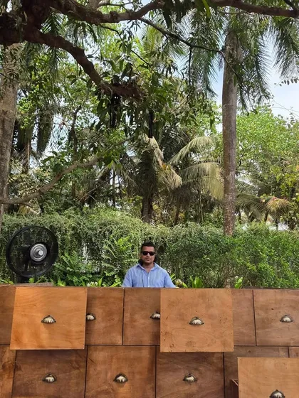 A wider view of my unique wooden DJ console at the Goa brunch. I work with planners to ensure my setup complements the event's aesthetic.