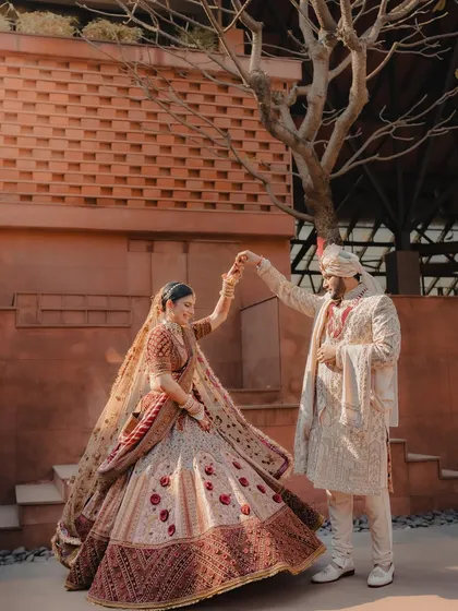 A graceful twirl against a modern architectural backdrop. We help find unique spots for portraits that are both romantic and visually interesting.