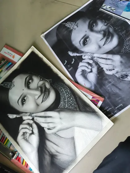 Here you can see the finished drawing next to the original reference photo. My goal is always to stay true to the source image while adding my own artistic touch to the final piece.