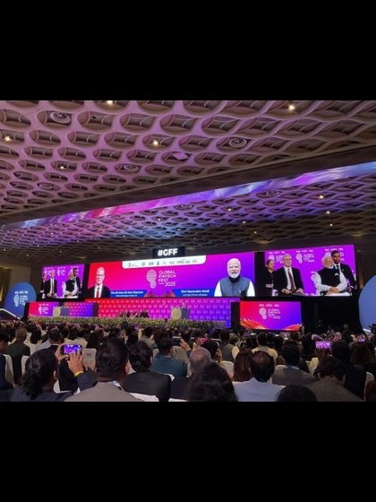 A wide shot of the Global Fintech Fest 2025, an event with over 100,000 attendees. Our team managed show calling, console operations, and breakout rooms, handling addresses from global leaders including PM Narendra Modi.